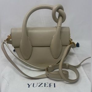 Yuzefi Dolores leather crossbody bag with dust bag in Natural